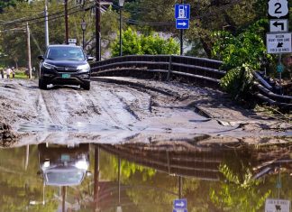 Snow shovels in hand, volunteers help Vermont communities clear the mud from epic floods – Daily Press
