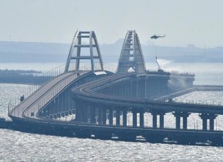 Key Russian bridge to Crimea is struck again as Putin vows response to attack that killed 2 – Daily Press