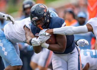 UVA running back Mike Hollins, wounded in a deadly attack, returns for a new season as an inspiration to teammates – Daily Press