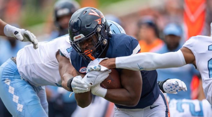 UVA running back Mike Hollins, wounded in a deadly attack, returns for a new season as an inspiration to teammates – Daily Press